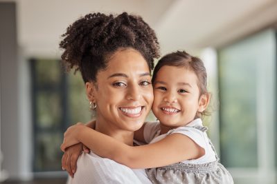 Family, love and bond of mother and daughter sharing a hug.